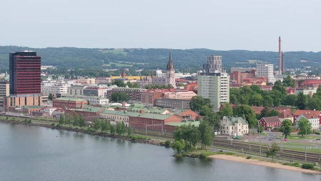 Jonkoping city lakeside and aerial view of urban area with cultural and commercial buildings. Sweden cityscape.