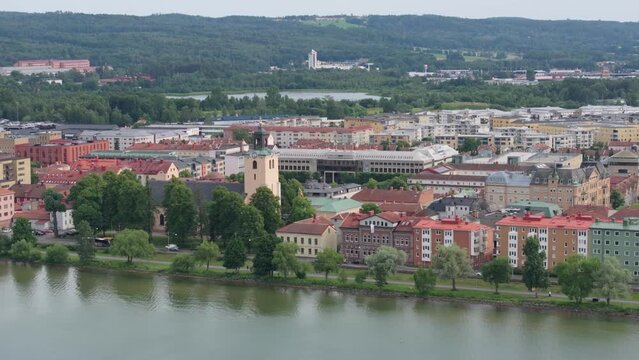 Old church on lakefront Lake Vattern, Jonkoping, Sweden. Aerial cityscape, landscape.