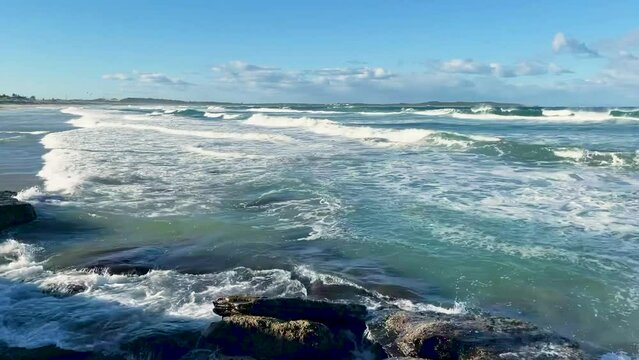 HD Video -Fairweather, waves and rockpools on the shoreline at North Cronulla Beach in Sydney, NSW, Australia.