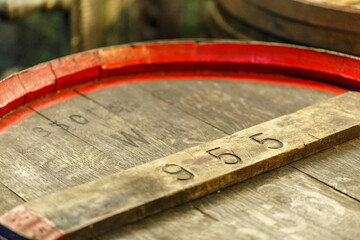 955 on an old oak barrel or cask
