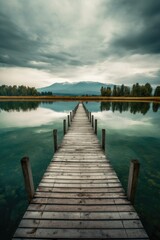 wooden pier stretching out over calm lake