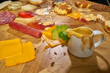 A very messy table full of fast food.