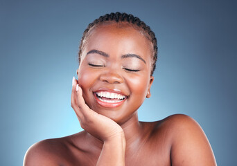 Face of black woman for cosmetics, beauty and eyes closed on blue background for wellness, facial or spa. Salon aesthetic, dermatology and happy African person in studio for skincare, makeup and glow