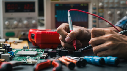 Electronics technician, electronic engineering electronic repair,electronics measuring and testing, repair and maintenance concepts.	