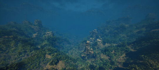 Fototapeta na wymiar Jungle with rock pillars in mist with cloudy sky.