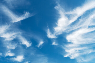 Beautiful blue sky with gentle white clouds. Aerial background view from of clear blue skies and...