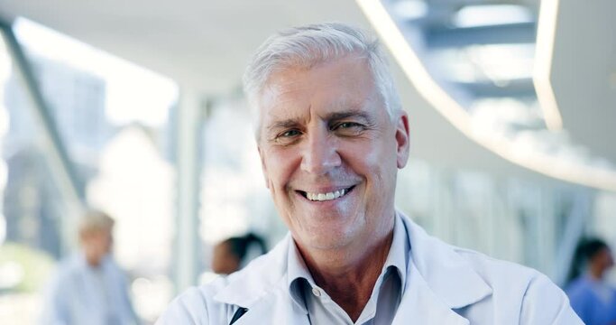 Man, face and doctor smile in hospital for medical services, expert advice and consulting in Australia. Portrait of happy surgeon, senior manager and healthcare therapist with pride in busy clinic