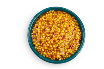 Bowl with french mustard isolated on white background with full depth of field. Top view. Flat lay.