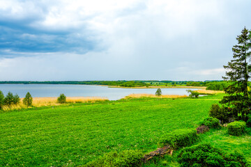 Fototapeta na wymiar View of the Grimnitzsee near Barnim, Joachimsthal. Landscape at the lake with the surrounding nature.