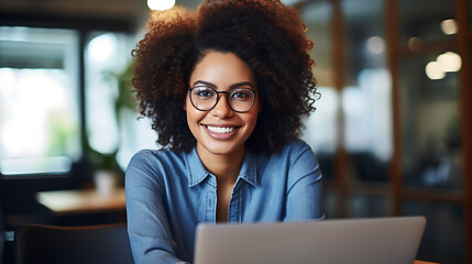 Close up portrait of young beautiful african american woman smiling while working with laptop in office.Created with Generative AI technology.