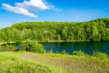 Jezioro Turkusowe near Wapnica. Lake in Wolin National Park in Poland. Idyllic landscape with green nature by the lake. Turquoise lake. 
