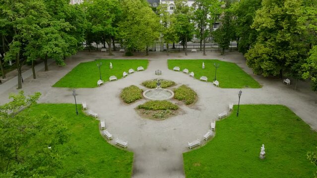 A drone shot of Henryk Sienkiewicz Park in Lodz. Aerial, Greenery, Nature, Tranquil, Peaceful, Urban escape, Outdoor, Green oasis, Fresh air, Nature's beauty, Relaxation, Beauty, Refreshing