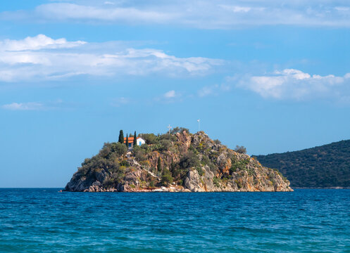 View from resort town  Tolo to island Koronisi with Holy Apostles Church in Peloponnese