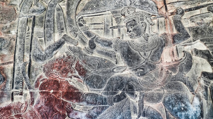 Wall carving of Khmer Culture in Ancient ruins Angkor Wat temple - famous Cambodian landmark. Siem Reap, Cambodia.