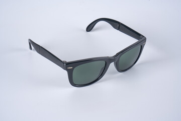 black Wayfarer sunglasses on a white background