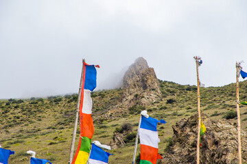 Tibetan Buddhist Prayer Flags on a Green Mountain Hilltop in Kagbeni of Upper Mustang, Nepal