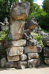 Fototapeta na wymiar Pile of balanced rocks in woodland, Derbyshire, UK.