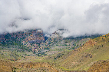 Green Foggy Mountain Landscape of the HImalayas in Kagbeni of Upper Mustang, Nepal