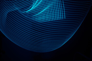 Abstract light painting with colored lights simulating a futuristic pattern of blue colors. 3D render