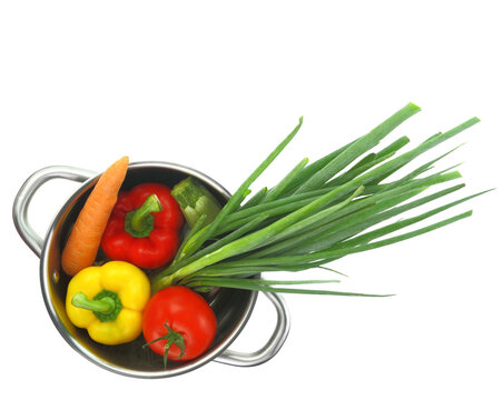 Fresh vegetables into a cooking pot isolated on white transparent background, PNG