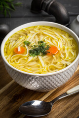 Tasty meat broth with noodles.