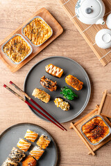 sushi is a Japanese dish of prepared vinegared rice, usually with some sugar and salt, accompanied by a variety of ingredients such as seafood, often raw and vegetables.