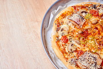 Homemade organic Italian pizza on table.