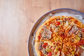 Home made, hot and organic Italian pizza on table. Mamma mia.