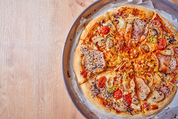 Home made, hot and organic Italian pizza on table. Mamma mia.