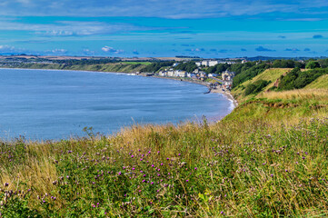 View towards Filey from Filey Brigg on a sunny morning.