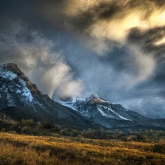 High mountain landscape with peaks, dramatic clouds and beautiful scenery