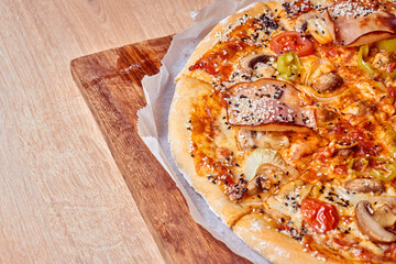 Home made, hot and organic Italian pizza on table. Mamma mia.
