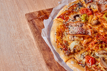 Home made, hot and organic Italian pizza on table. Mamma mia.