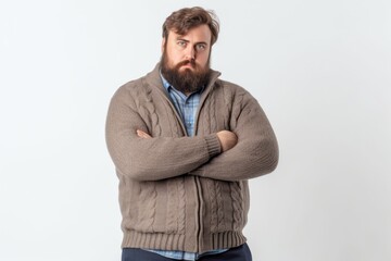 Lifestyle portrait photography of a man in his 20s expressing concern about his weight due to obesity wearing a chic cardigan against a white background  - obrazy, fototapety, plakaty