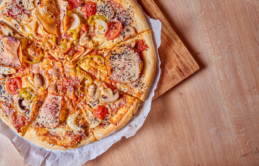 Home made, hot and organic Italian pizza on table. Mamma mia.