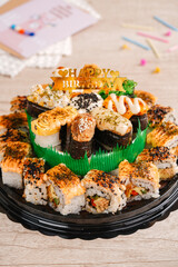 sushi is a Japanese dish of prepared vinegared rice, usually with some sugar and salt, accompanied by a variety of ingredients such as seafood, often raw and vegetables.