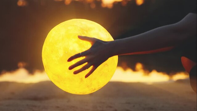 Happy Fantasy woman close-up hands holding moon touching magic light glowing planet raises to night sky clouds. body part arm person, dark water river lake. Girl pray dream fairy art. Girl goddess 4k