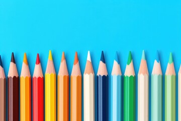 Colored pencils on blue background