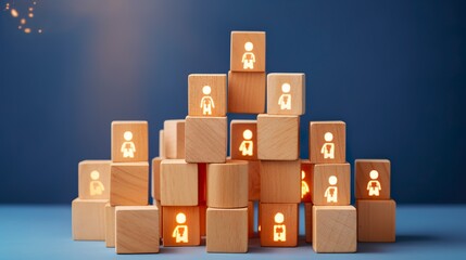 Fototapeta premium Many wooden cubes with people symbols and one with a lightbulb symbol on blue background. 