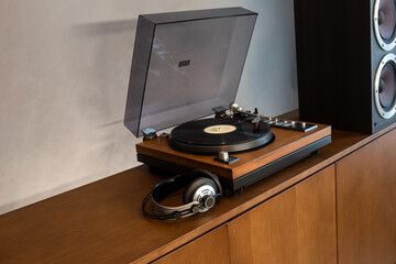 Home Stereo Turntable System Placed on Retro Self with Space for Text. - 632990826