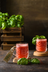 watermelon drink with basil on a dark background