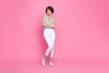 Full body size photo of young confident influencer woman bob brown hairstyle crossed hands model charming isolated on pink color background