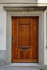 Beautifull old wood entrance door.  Large door, exterior shot, no people, Europe