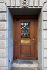 Beautifull old wood entrance door.  Large door, exterior shot, no people, Europe