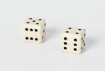 Two white dice on a white isolated background