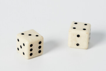 Two white dice on a white isolated background