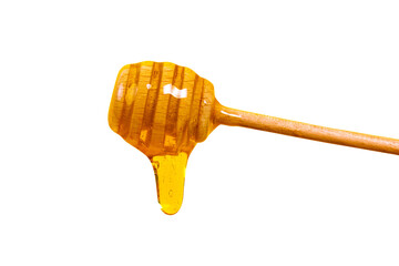 Honey dripping from honey dipper isolated on transparent background. Thick honey dipping from the wooden honey spoon. Healthy food and diet concept