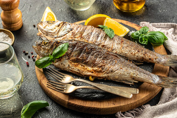 delicious grilled sea bream fish with lemon. Detox and clean diet concept. place for text, top view