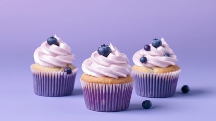 Illustration of delicious cupcakes topped with fresh blueberries and fluffy whipped cream