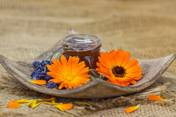 honey and flowers - calendula and lavender - obrazy, fototapety, plakaty